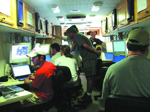 Students working in the GIS Bus